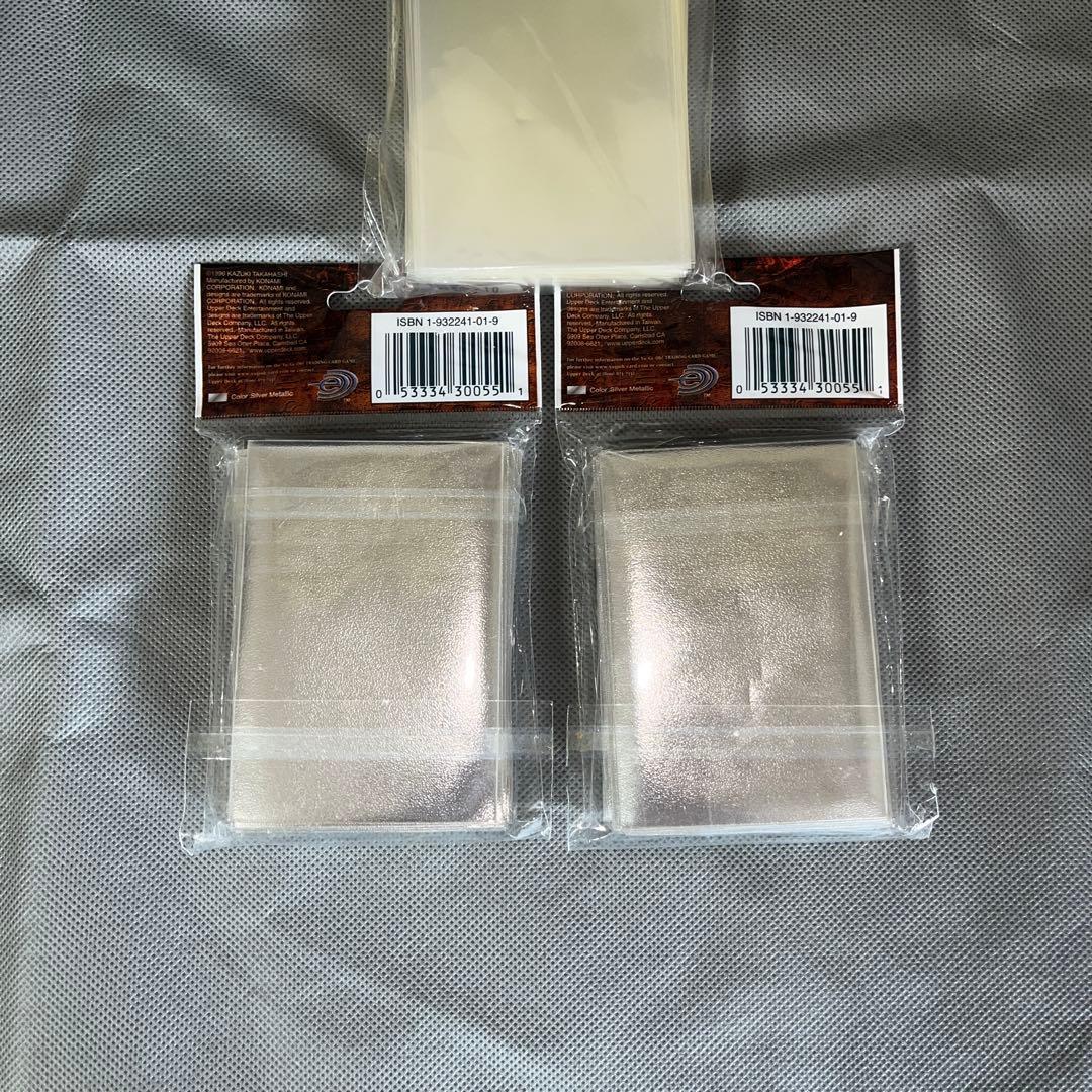 公式】 遊戯王 スリーブ 海外 初期ロゴ 50枚×2 銀 メタリック - メルカリ