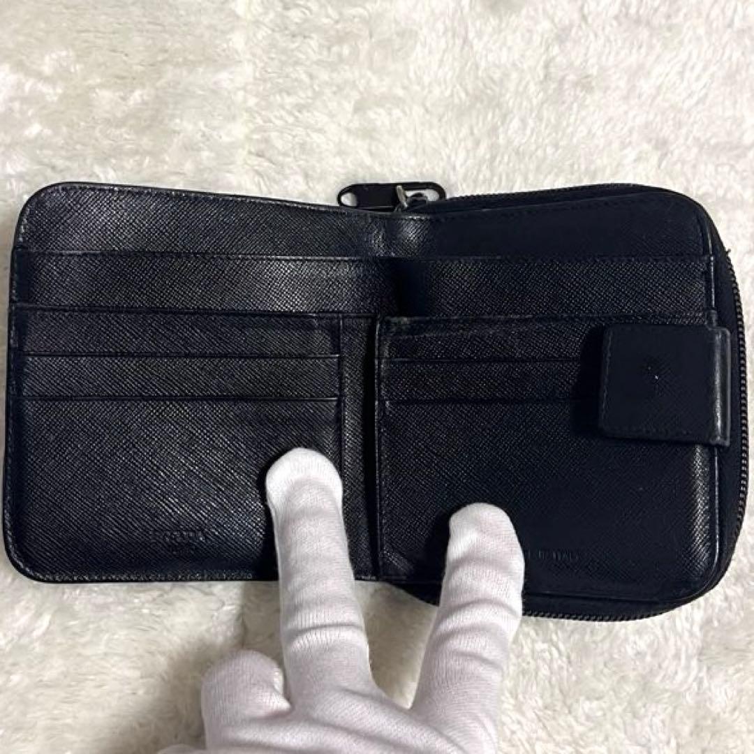 プラダ財布　二つ折り　サフィアーノレザー　三角ロゴ　ジップ