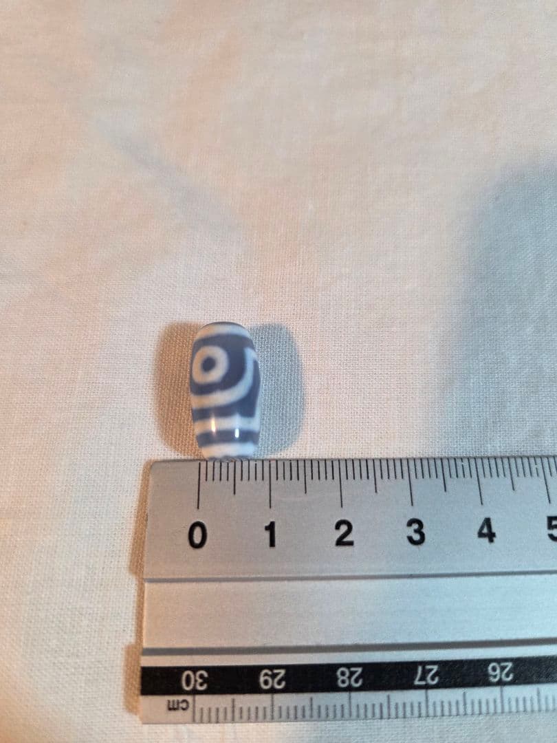 ブルーの二眼天珠